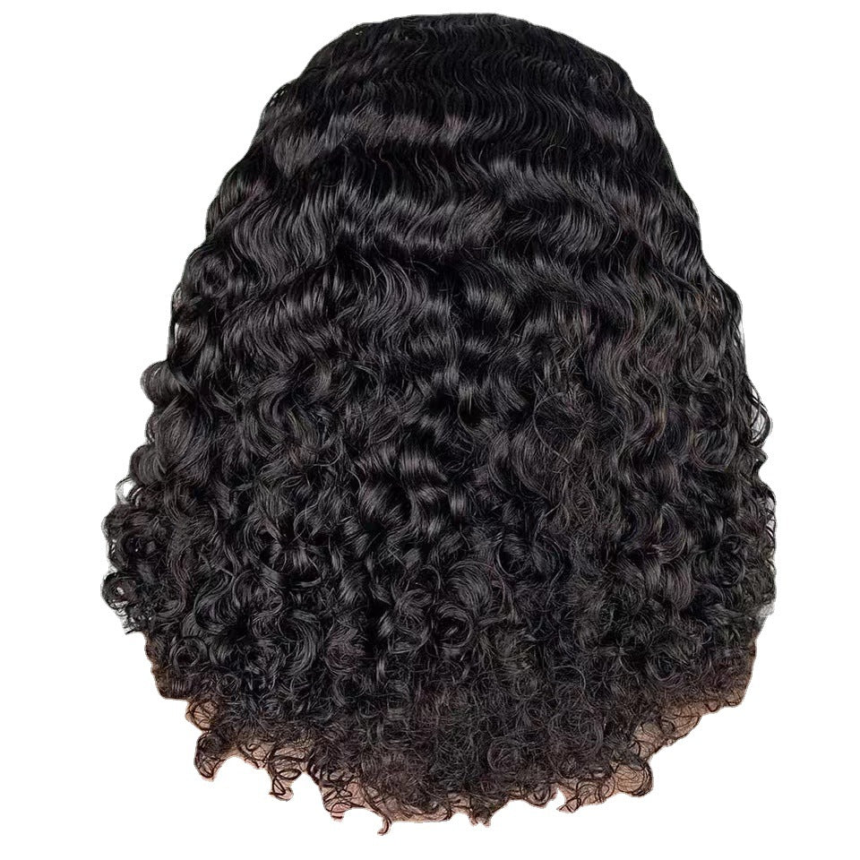 Black curly hairpiece on a white background